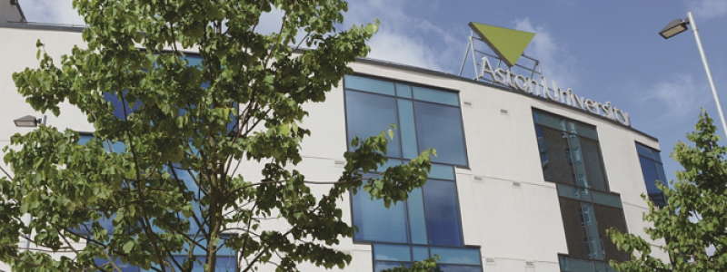 Aston University campus building with logo